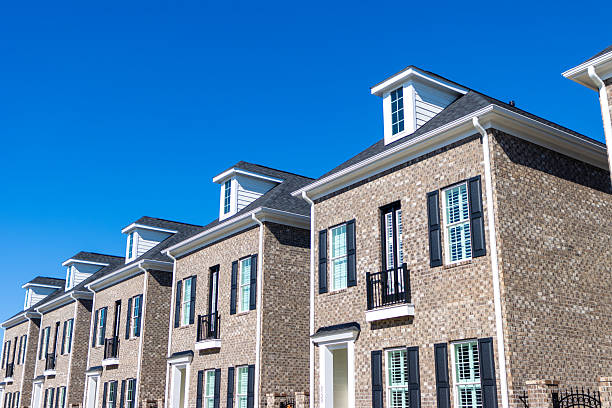 istock Newly built townhomes in a row 2243472207