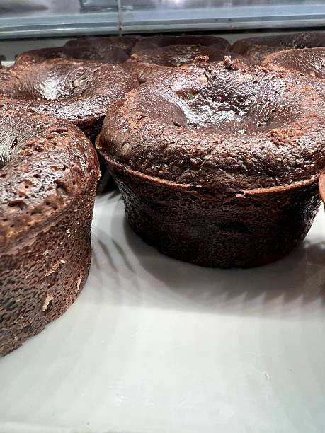 istock Homemade chocolate bundt cake cooling on white surface 2243481208