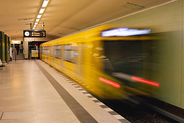 istock Yellow Metro Train Arriving at Underground Station, Berlin, Germany 2243483618