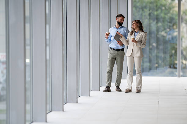 istock Business people having coffee break conversation in office 2243488934