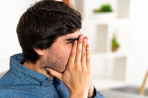 istock Young man coping with stress and mental health issue 2243490041