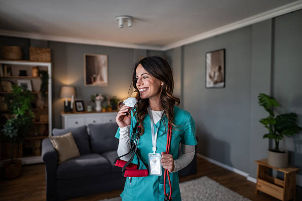 istock Nurse eating snack at home during work break 2243492250