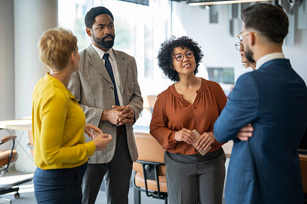 istock Business people talking during informal meeting in office 2243495366