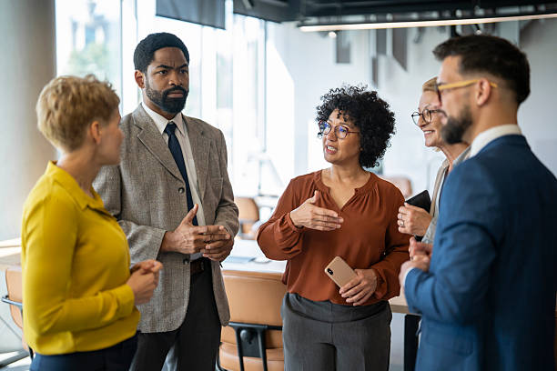 istock Diverse business team discussing a project in modern office 2243495367