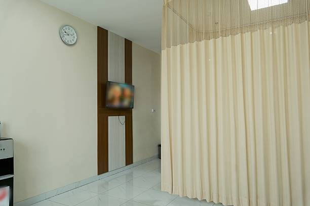 istock Hospital Interior with Beige Curtain Partition 2243496298