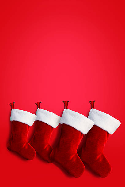 istock Christmas Stockings On Red Background 2243505845