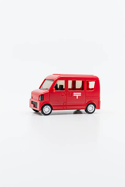 istock Japanese red mail car. Japan Post miniature car. 2243508932
