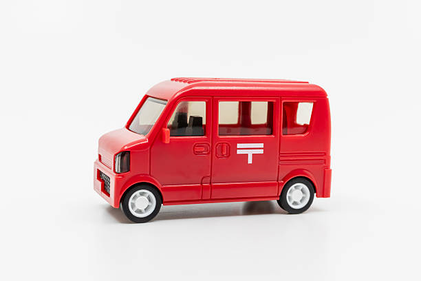 istock Japanese red mail car. Japan Post miniature car. 2243508933