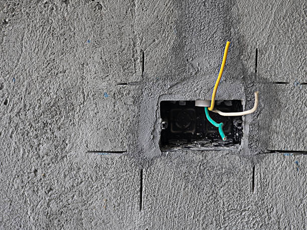 istock Electrical cables passing through pipes are being installed and not yet completed. 2243515330