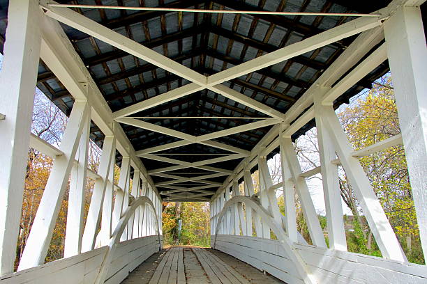 Manns Choice, Pennsylvania, USA - October 19, 2025: Inside the historic Turner Covered Bridge crossing the Juniata River in the Susquehanna Valley of western Pennsylvania.