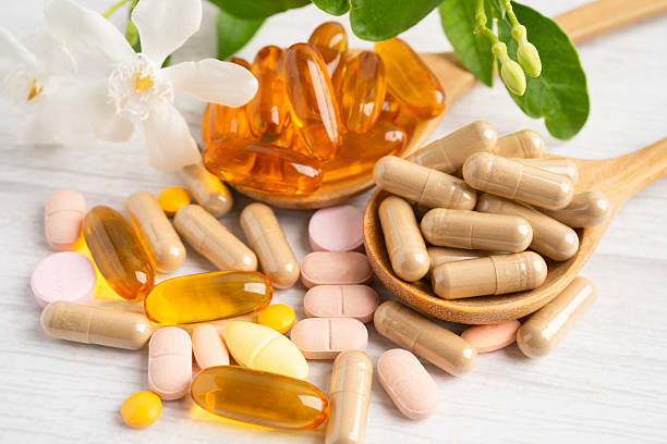 istock Alternative medicine herbal organic capsule drug herb. 2243522862