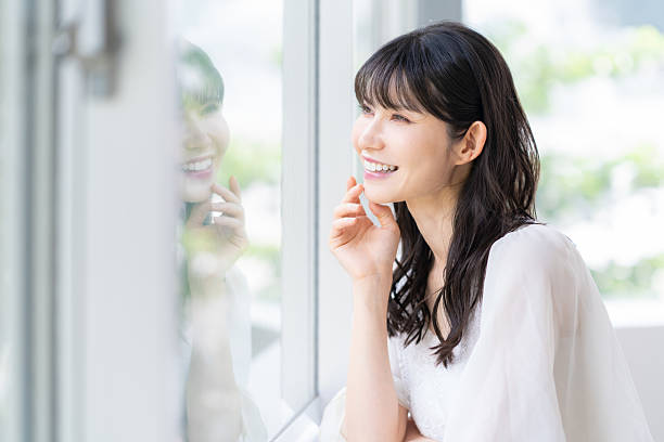 istock middle-age woman doing beauty care at home 2243527874