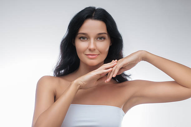 istock Confident Woman With Natural Beauty And Elegant Hand Pose 2243530934