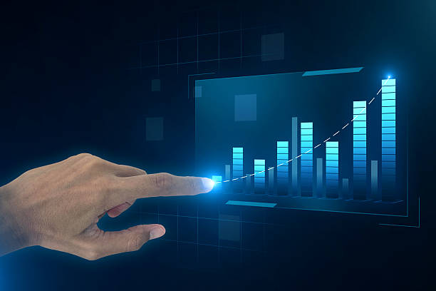 istock Businessman hand touching virtual digital hologram interface shows financial data analysis graphs or the stock market. style clean futuristic technology design. 2243531085