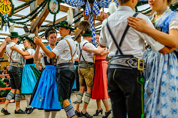 Munich, Germany - October 5: typical bavarian dancer with traditional clothes at the oktoberfest in munich on October 5, 2025