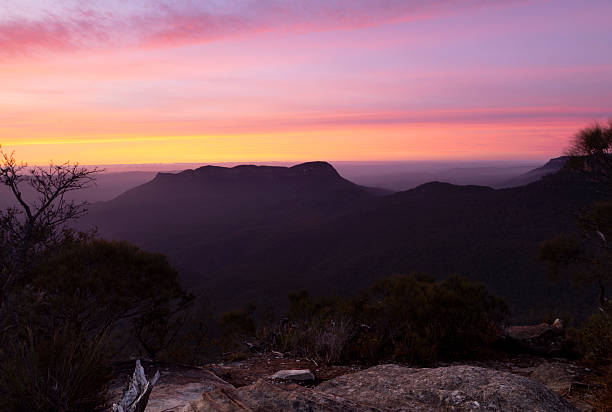 istock Dawn sunrise over dark mountains 2243531509