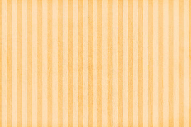 Old faded look beige and light brown coloured striped pattern vector backgrounds with alternate full frame pattern of bands in two shades all over for retro baby nursery wallpaper design . Apt to use as a wallpaper, gift wrapping paper, greeting cards and posters.