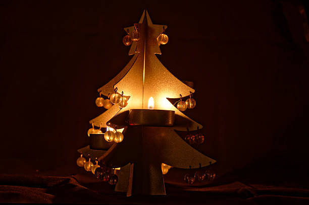 Tea lights on a metal Christmas tree