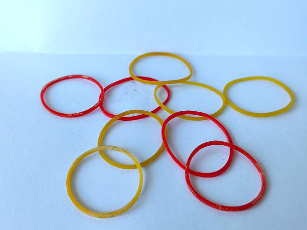 istock Red and yellow rubber bands used to tie packages 2243536908