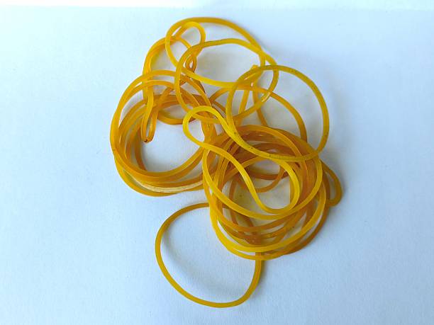 istock Red and yellow rubber bands used to tie packages 2243537030