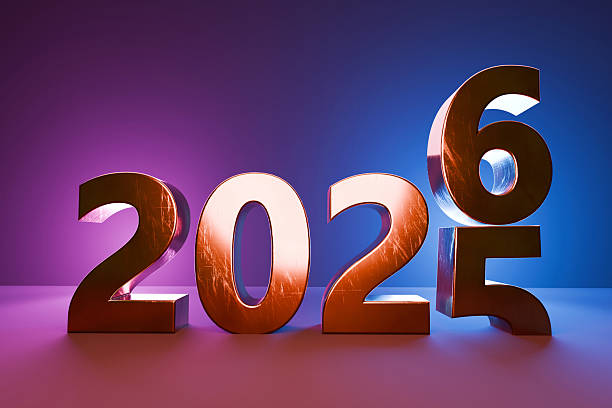Golden 3D numbers transitioning from 2025 to 2026, symbolizing New Year celebration, future, progress, and change, with vibrant purple and blue lighting background. 2026, creative idea.