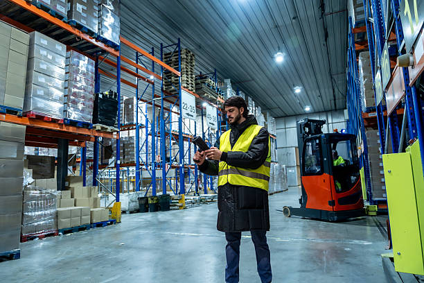 istock Worker scanning goods in cold storage logistics warehouse 2243537881