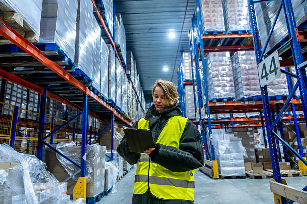 istock Woman warehouse worker checking inventory in cold storage logistics 2243538001