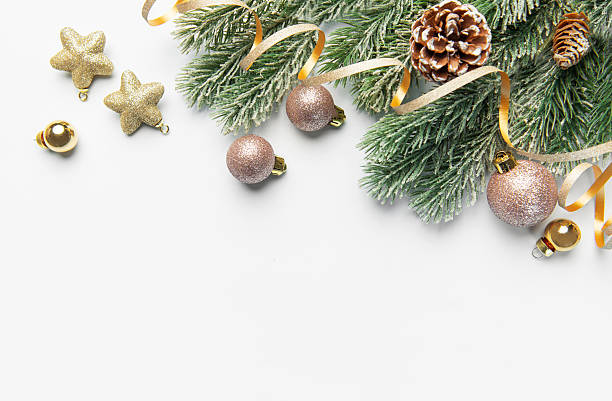 istock Christmas tree branch decorated with festive ornaments, pinecones 2243539507