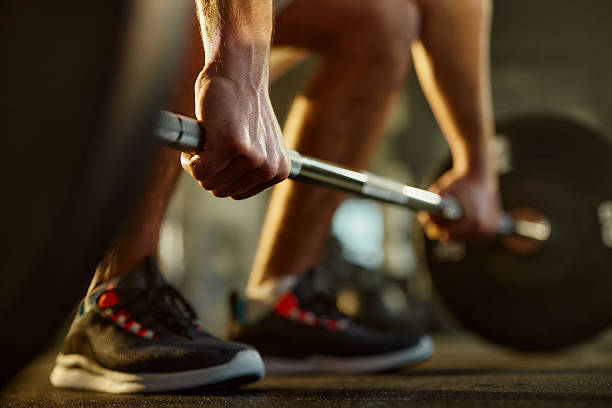 istock Snatch with barbell in a gym! 2243539588