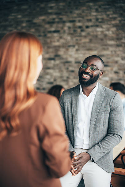 istock Coworkers talking about strategy in modern office 2243545012