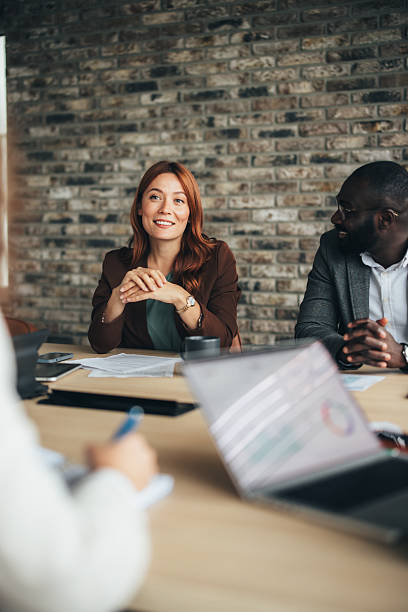 istock Confident businesswoman discussing project in office 2243545017