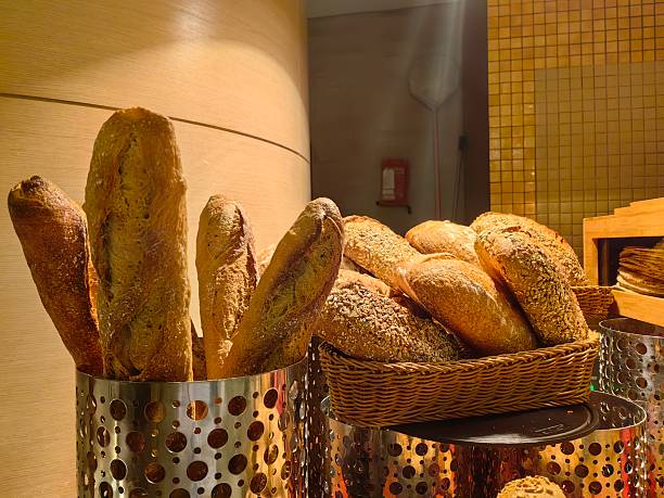 Some types of bread served in woven baskets .
