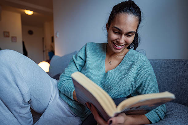 istock Peaceful Moments – Woman Reading at Home 2243558341