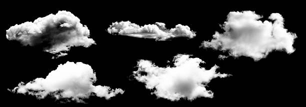 istock Fluffy white clouds isolated on black background, showcasing various shapes and textures 2243560077