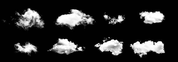 Various fluffy white clouds isolated on black background, showcasing different shapes and sizes