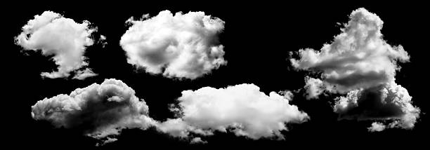 istock Fluffy white clouds isolated on black background, showcasing various shapes and textures 2243560081
