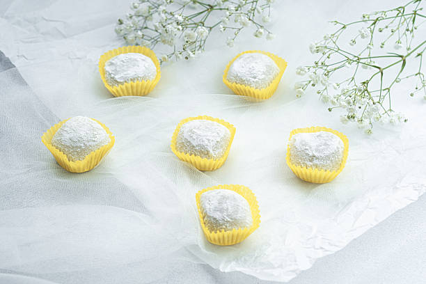 istock Delicate sweets arranged thoughtfully on a soft background with flowers 2243562147