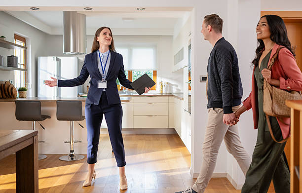 istock Estate Agent Talking With Potential Buyers 2243563601