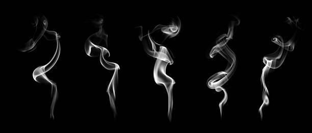 istock Abstract smoke waves on black background showing smooth motion and fluid shapes. Perfect for design, art, meditation, or spiritual concepts. Ideal for creative backgrounds and visual effects. 2243571040