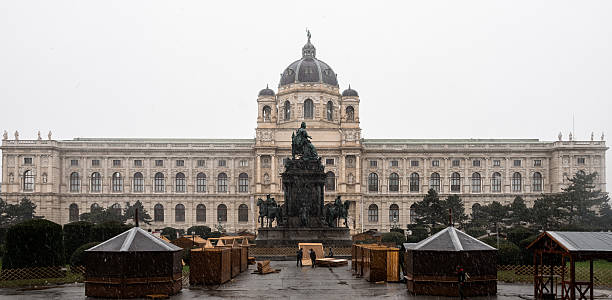 02/17/2025, Vienna, Kunsthistorisches Museum in Vienna, Austria, is showcasing its stunning dome and ornate facade under a cloudy sky, a testament to its rich history and architectural grandeur