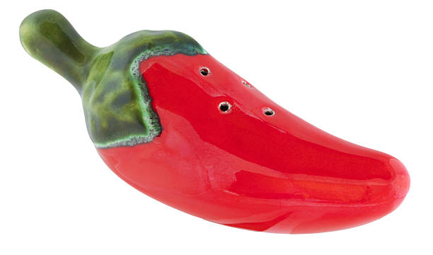 istock Close up of a salt shaker shaped like a chili 2243574563