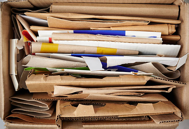 istock Reused paper in a litter box folded into a stack. Garbage for recycling. Garbage separation concept. 2243579280