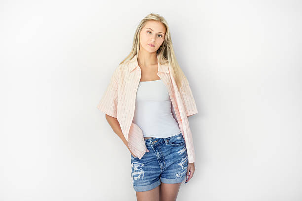 Pretty great blonde girl posing in studio