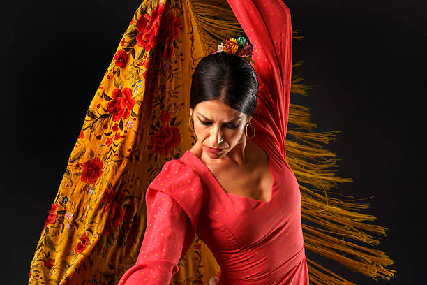 istock Flamenco dancer performing with flowing shawl displaying passion and traditional Spanish culture 2243589740