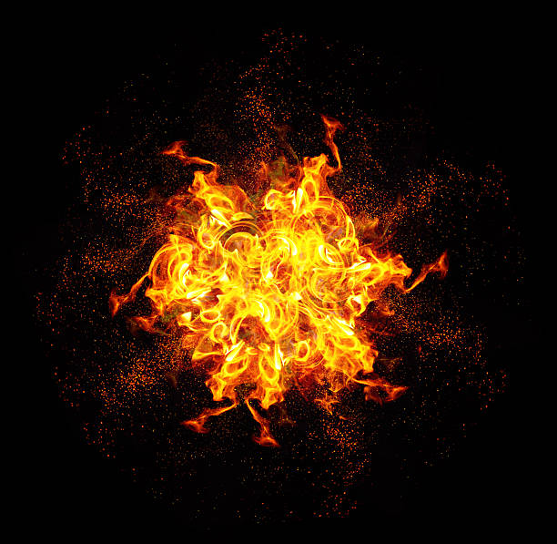 istock A bright, symmetrical fire explosion with intense yellow and orange flames. Sparks and particles are visible around the fireball 2243590559