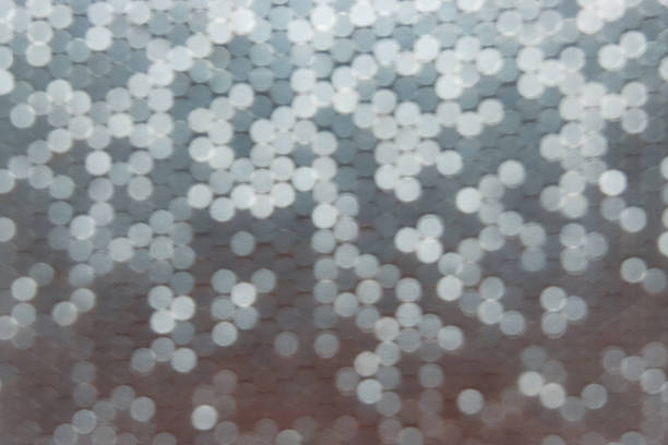 Bokeh effect of a board with metal pins known as pinpression. Blurry effect