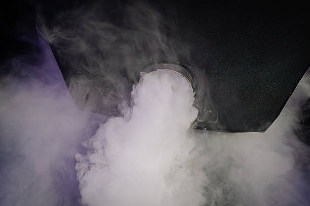 Smoke billowing from a vent, creating an atmospheric scene with swirling fog and dramatic lighting, enhancing the mysterious ambiance of the environment