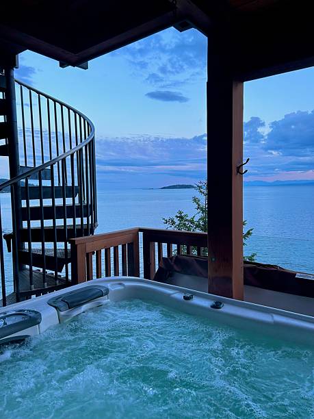 istock Waterfront Hot Tub with Ocean and Island Sunset View 2243595645