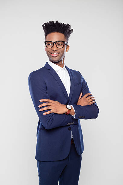 istock Stylish afro american businessman looking away 2243599292