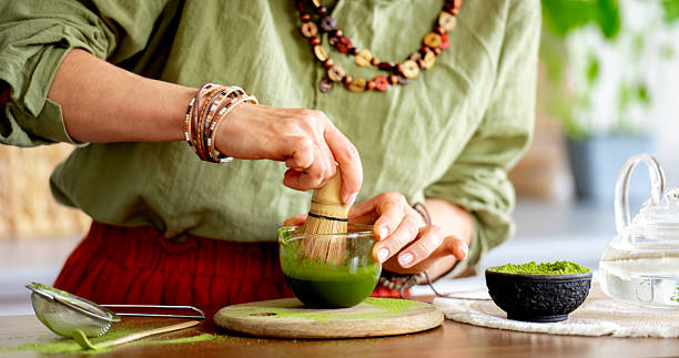 istock Woman Whisking Matcha Tea 2243600428